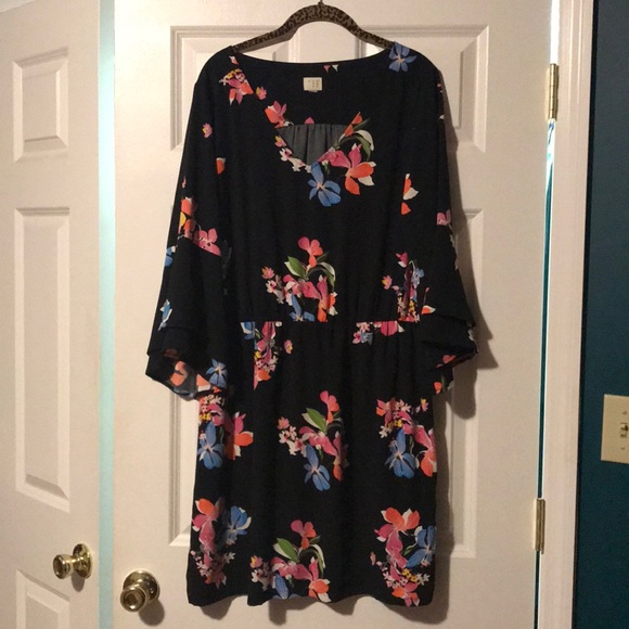 a new day Dresses & Skirts - Black floral dress with bell sleeves